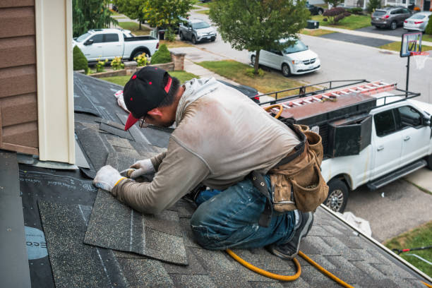 Professional Roof Replacement technician working in Rome City, IN